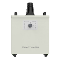 Front view of the Creality Falcon Smoke Purifier by Creality Falcon, designed for indoor use with a control panel, central dial, indicator lights, and large exhaust port to filter smoke and dust. The white unit features small wheels on the bottom corners.